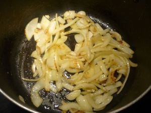 Brown the onion into the Olive Oil.